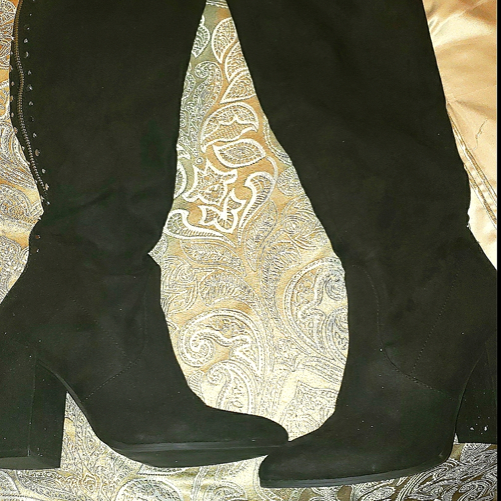 Knee length boots